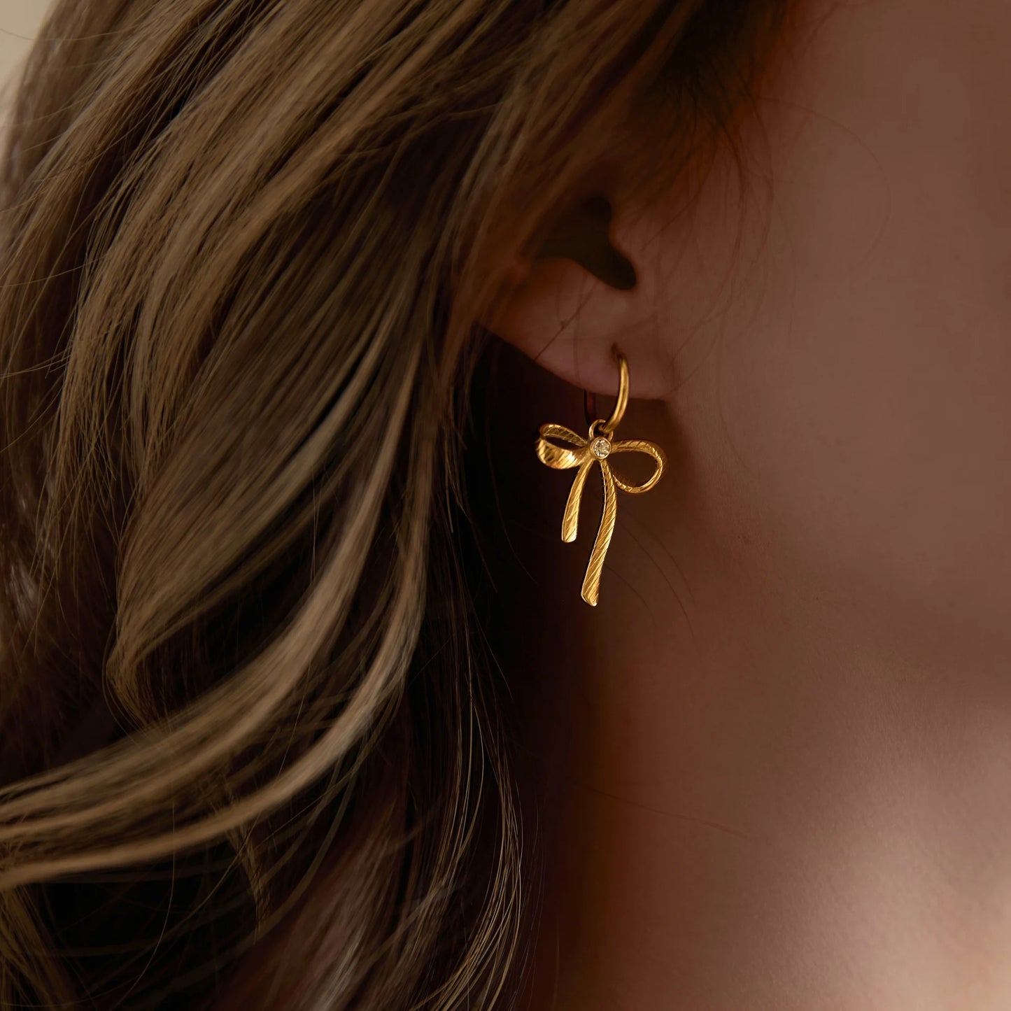 Dangle Bow Studs -18K