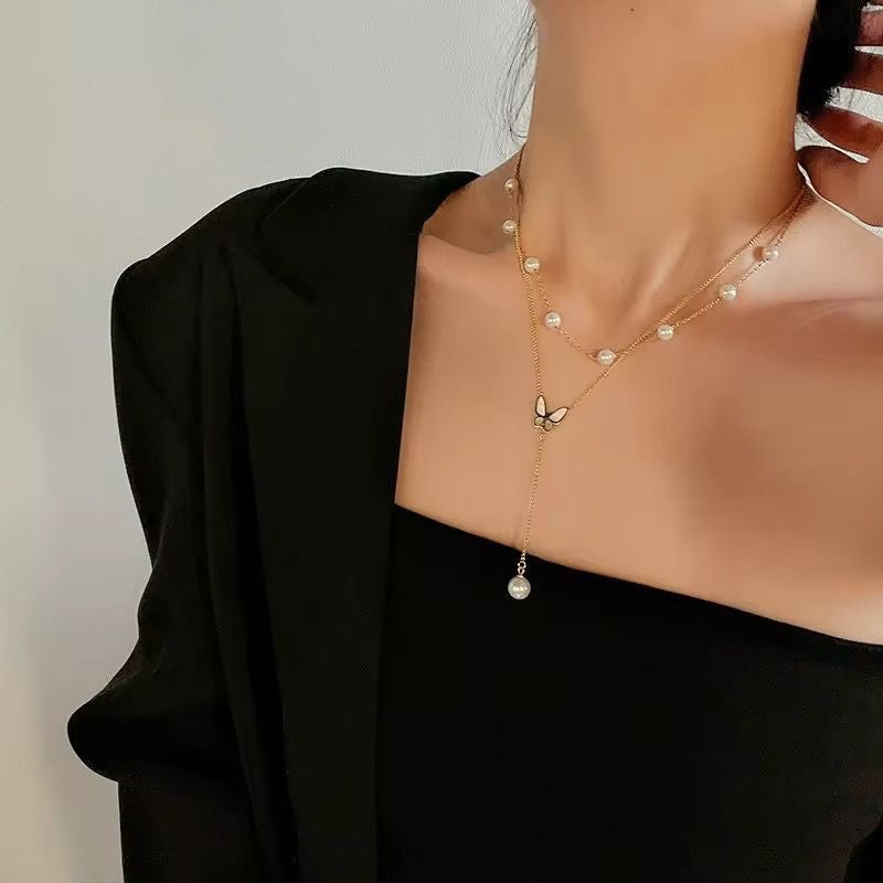Layered Pearl X Flutter Lariat Necklace
