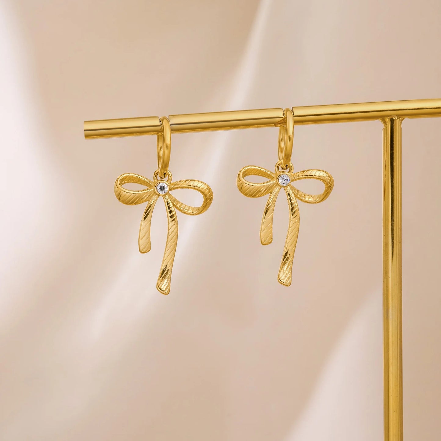 Dangle Bow Studs -18K