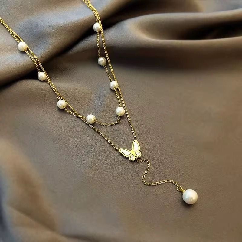 Layered Pearl X Flutter Lariat Necklace